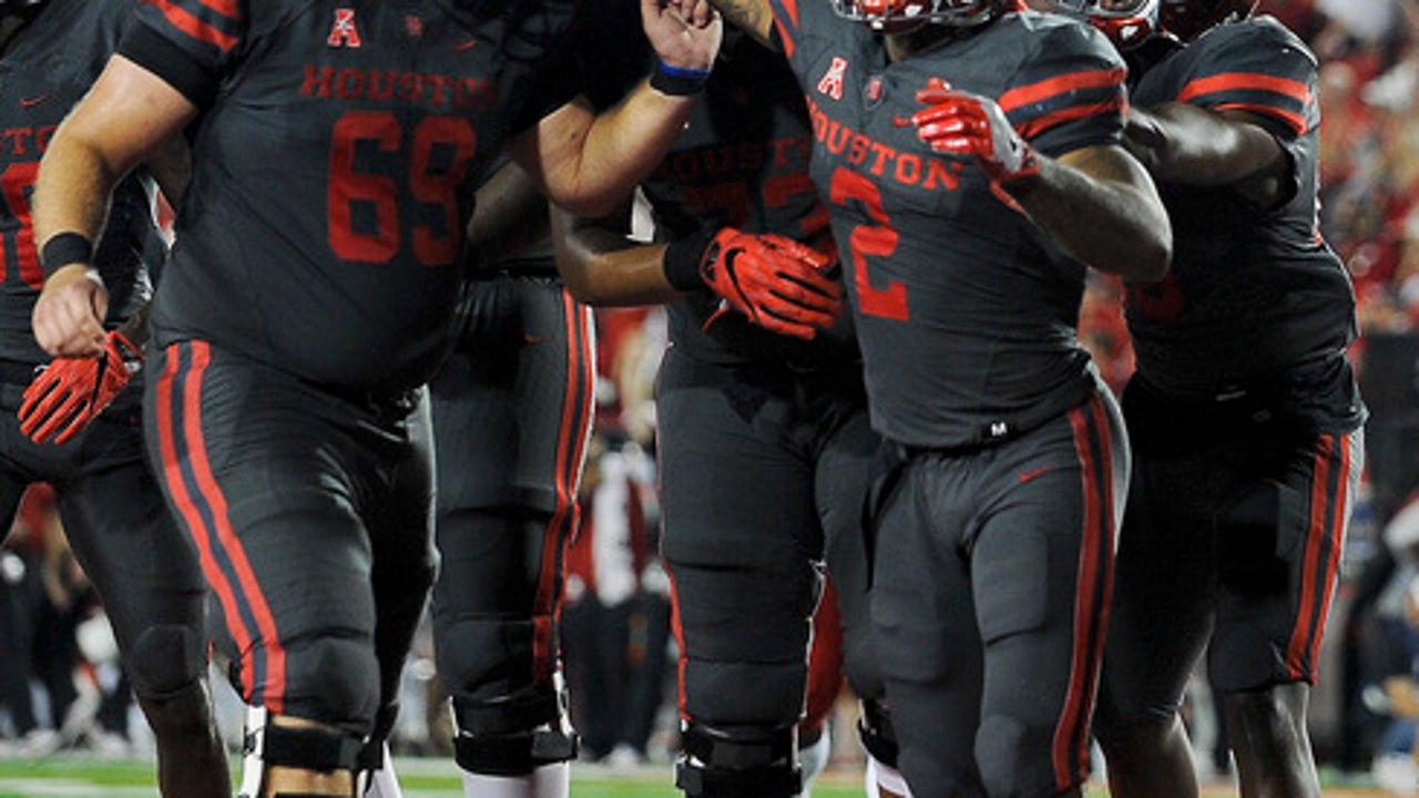 Cougars ruin No. 3 Louisville's playoff hopes with 36-10 win